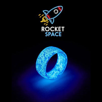 Glow in the dark ring on finger close up